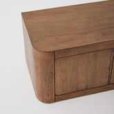 Side view of Oslo 4-Door Low Line Buffet in aged brown oak finish